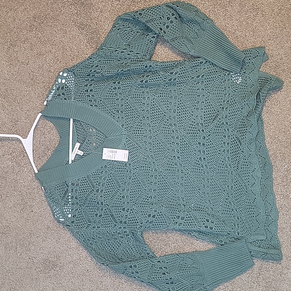 Never worn turquoise long sleeve